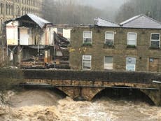 Flooding causes 200-year-old bridge pub near Manchester to collapse