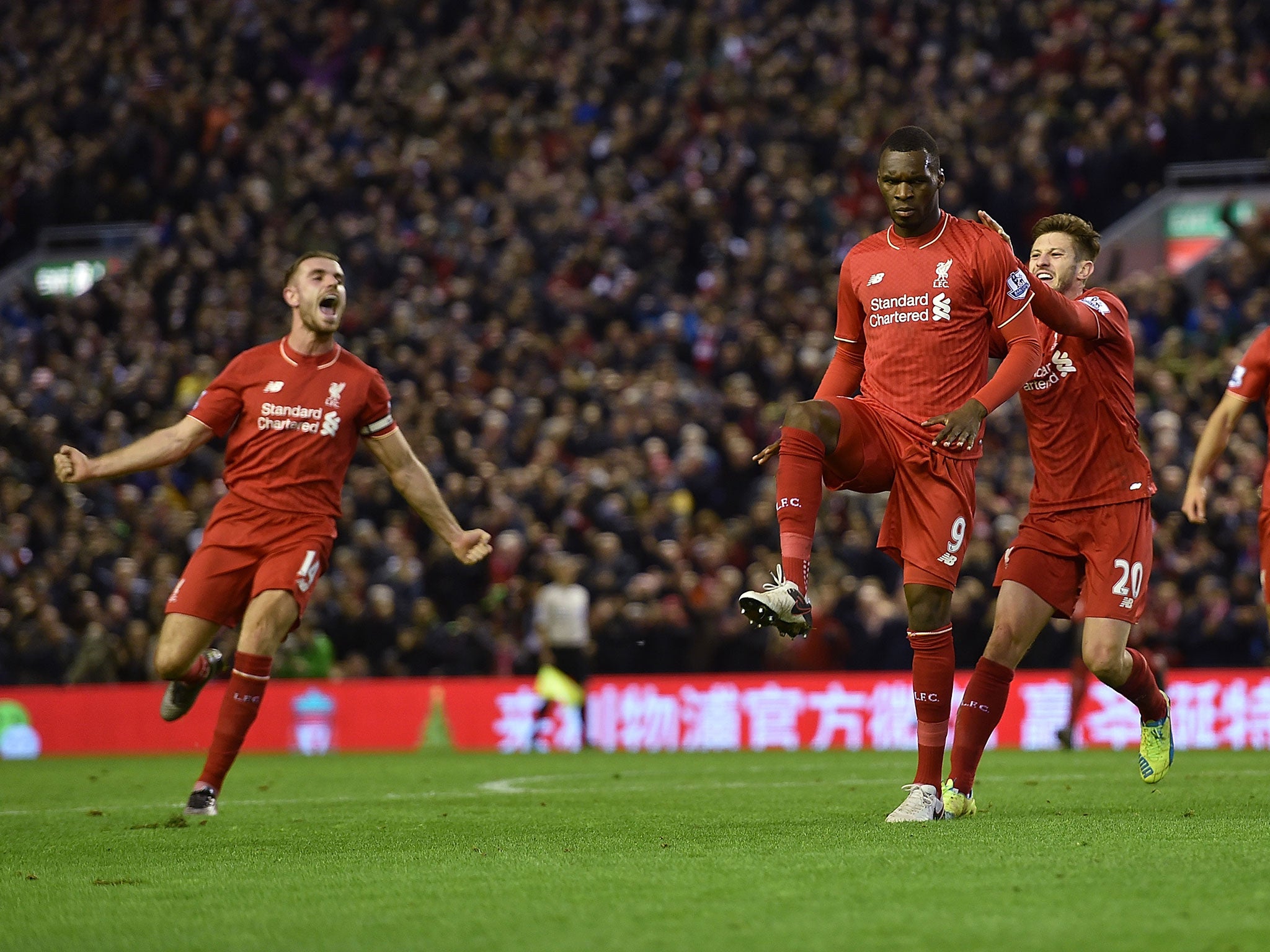 Christian Benteke celebrates giving Liverpool the lead against Leicester