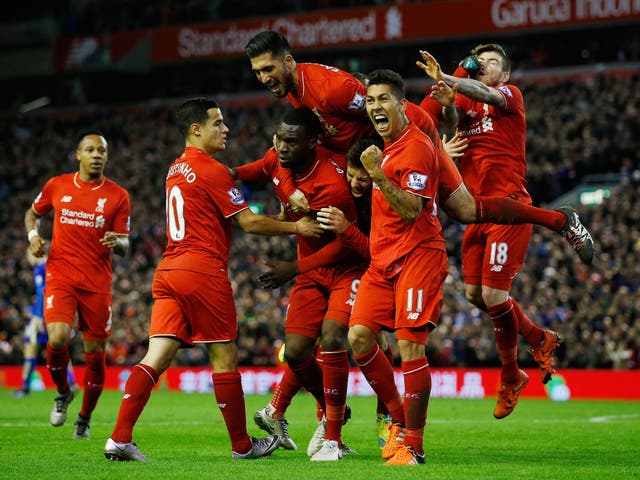Alberto Moreno is kicked in the face by Emre Can as Liverpool celebrate Christian Benteke's goal