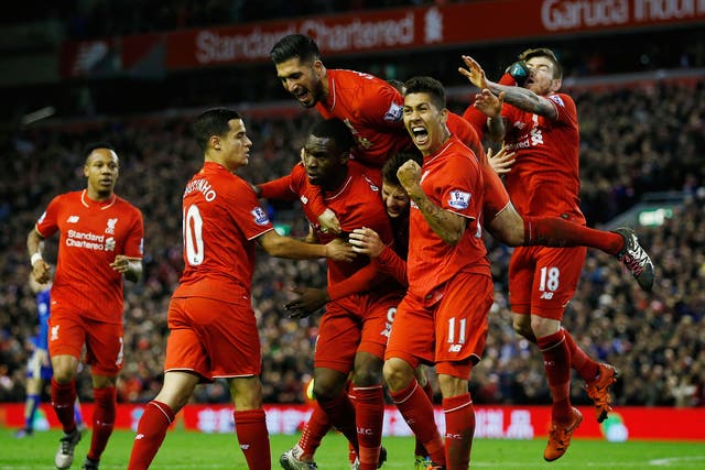 Alberto Moreno is kicked in the face by Emre Can as Liverpool celebrate Christian Benteke's goal