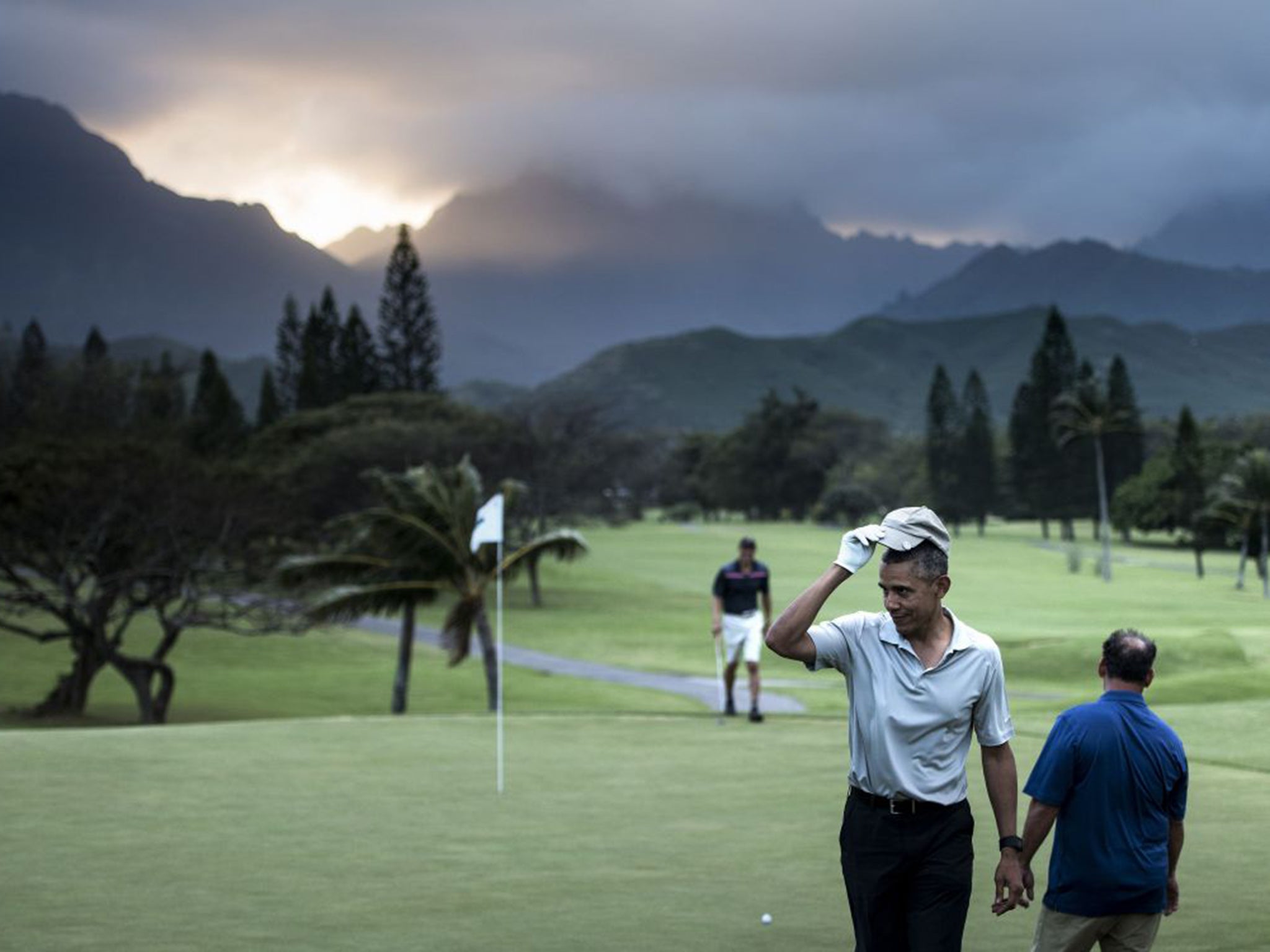 Obama relaxes on the golf course in Kailua last week. For US presidents, Hawaii is as exotic as it gets