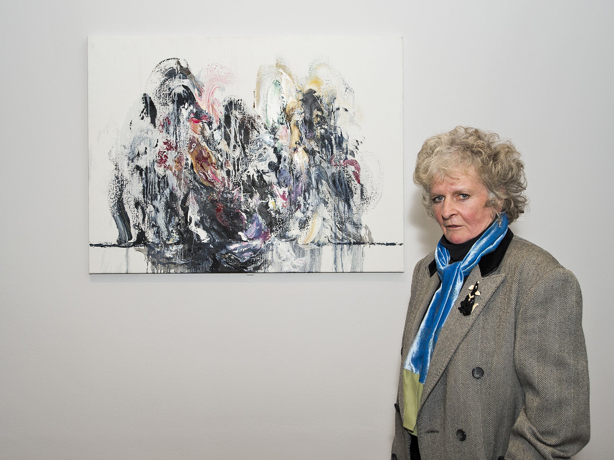 Maggi Hambling pictured with her 2011 piece, titled Amy Winehouse