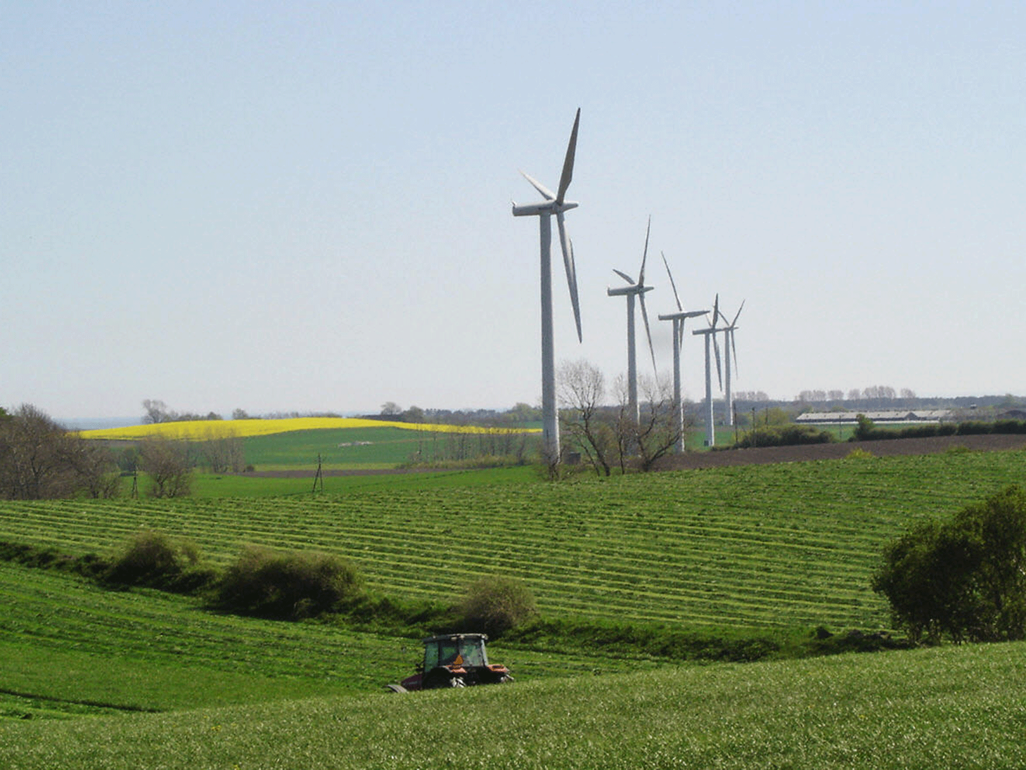 A picture taken 02 May 2007 shows wind-powered turbines that cover 100 percent of the electrical needs of the 4,200 residents on the Danish island of Samso. Solar panels cover heating for islanders.