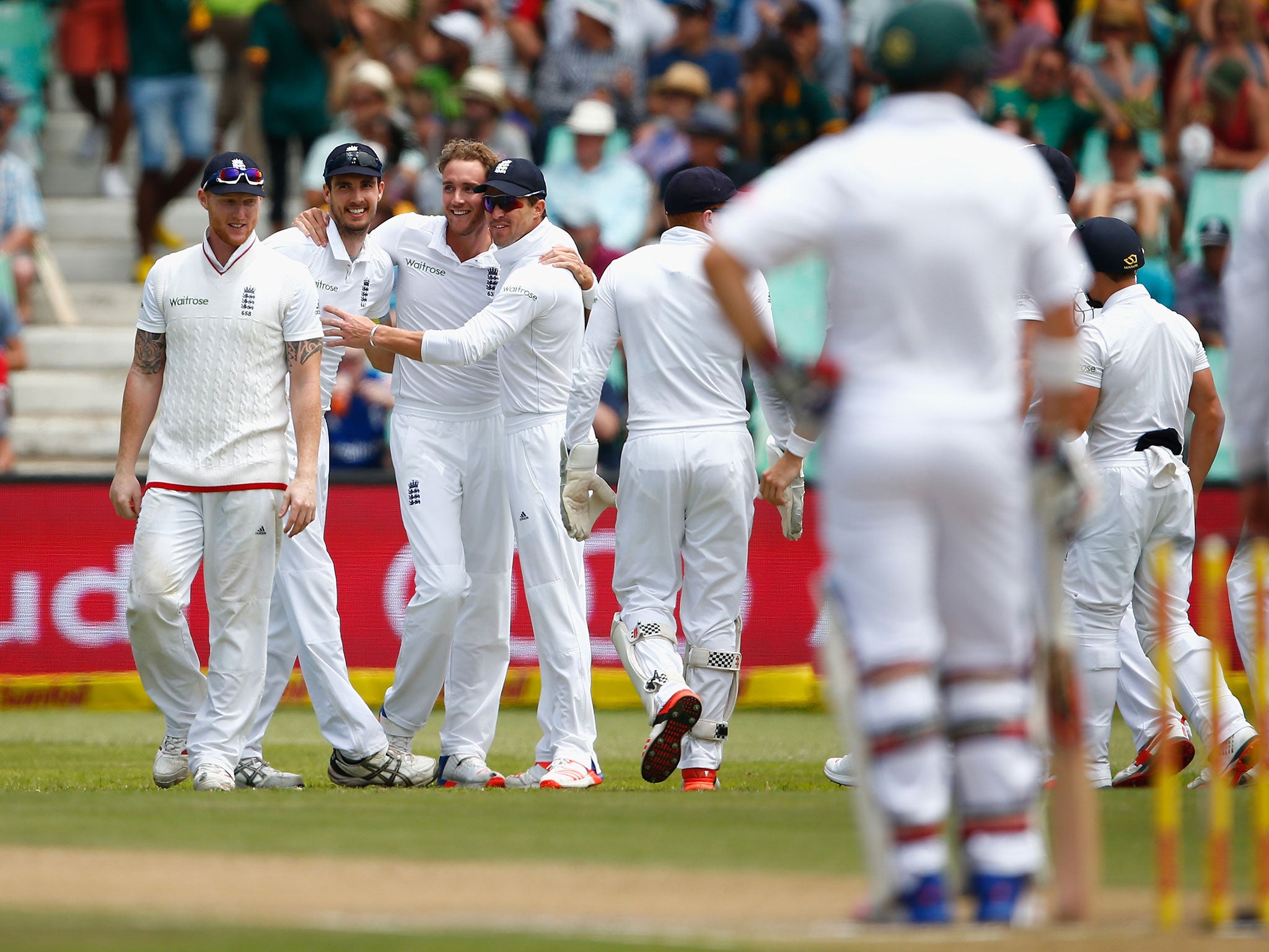 England celebrate after Stuart Broad bowls Stiaan van Zyl with the second ball of the innings