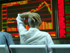 China stocks down 7 per cent forcing trading to be suspended