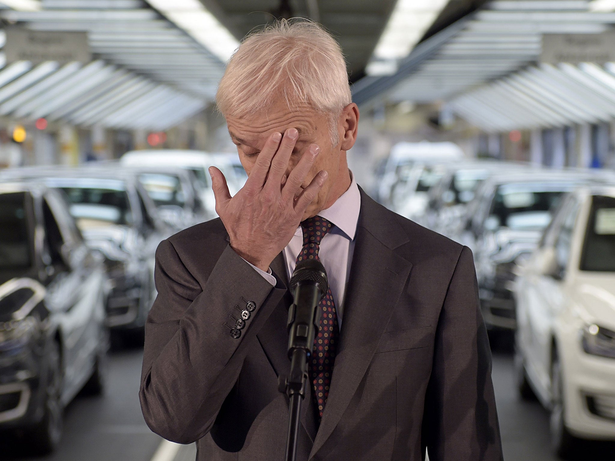 VW’s Matthias Muller faces the press