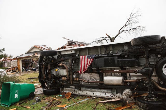 An American flag placed by first responders is seen December 27, 2015 in the aftermath of a tornado in Rowlett, Texas. 