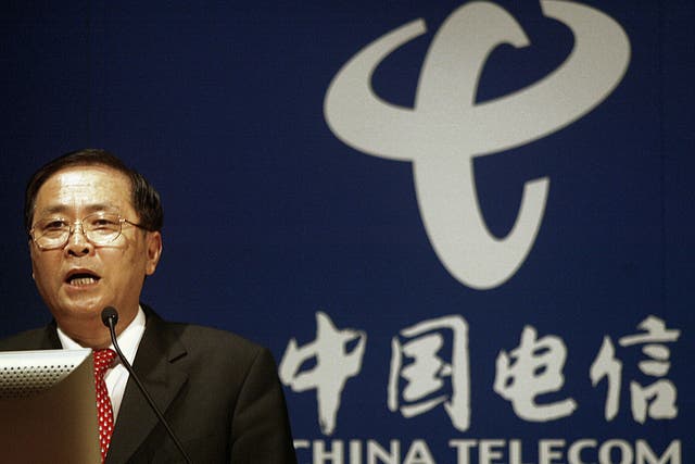 Chairman and CEO of China Telecom, Chang Xiaobing speaks at the announcement of their annual results for 2003, 17 March 2004.