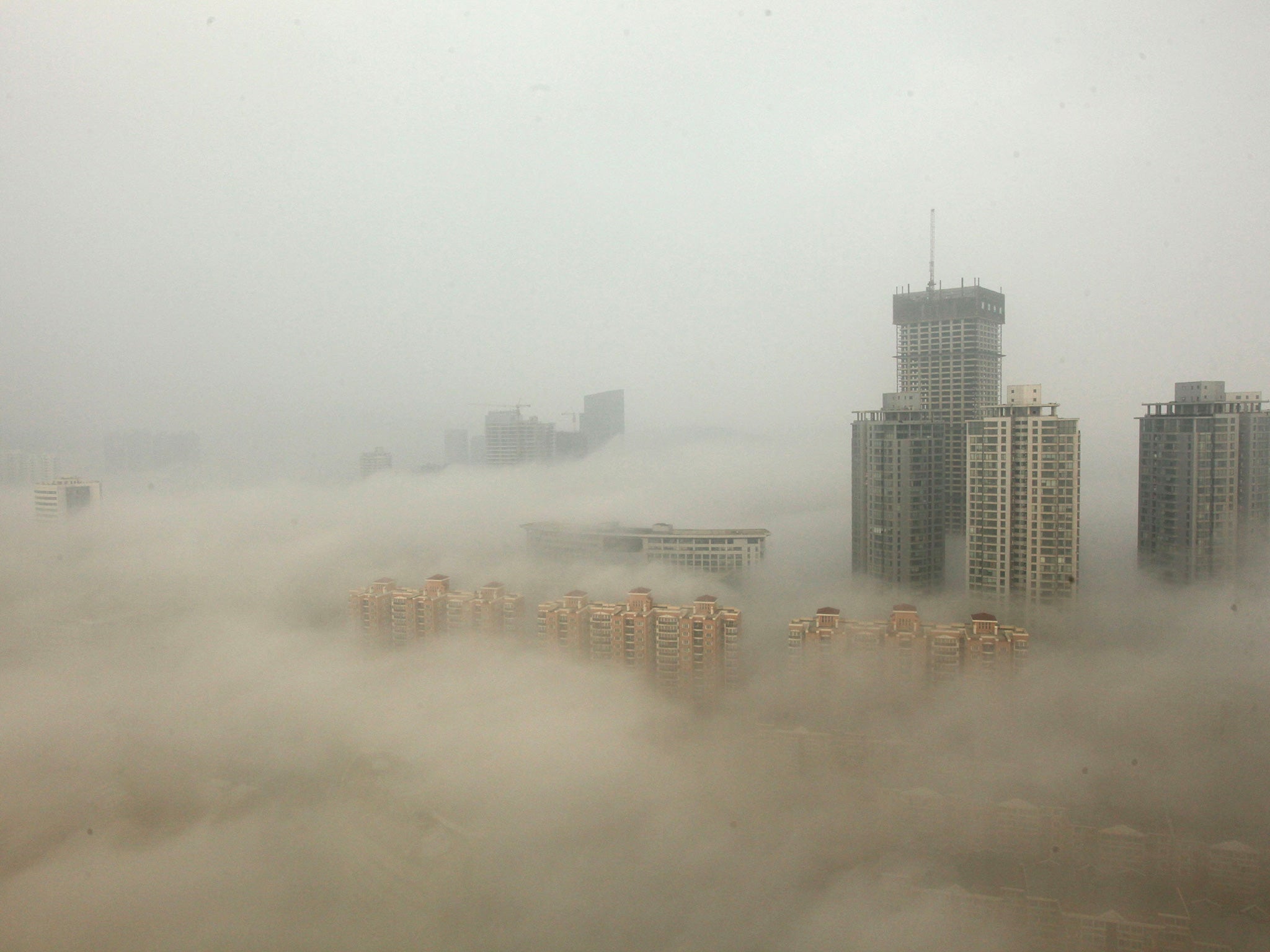 Buildings are shrouded in smog in Lianyungang, China
