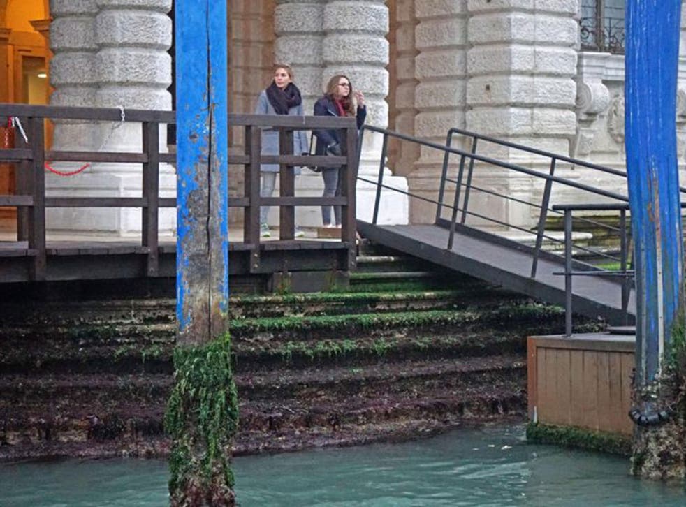Exceptional low tides were evident even along Venice’s Grand Canal on Sunday