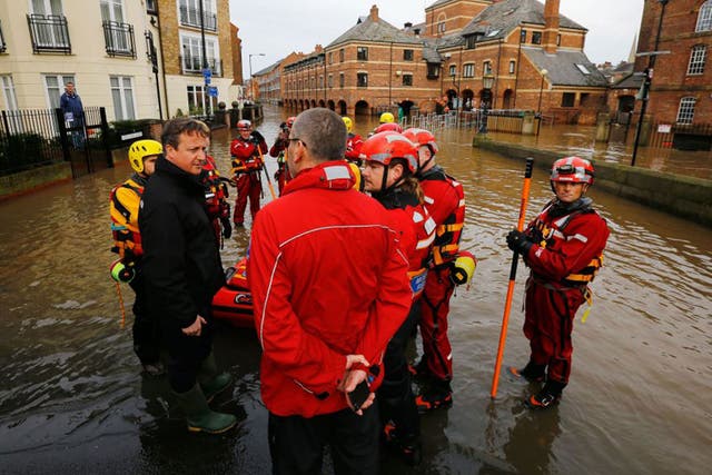 Ripple effect: David Cameron in flood-stricken York as pressure mounted on the Government over its lack of readiness to deal with the crisis