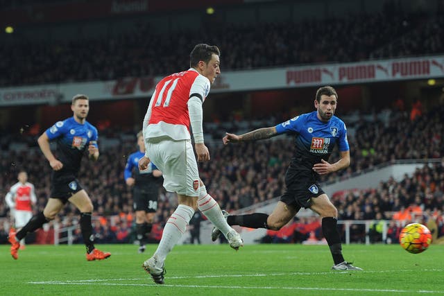 Mesut Ozil scores the Gunners second of the game