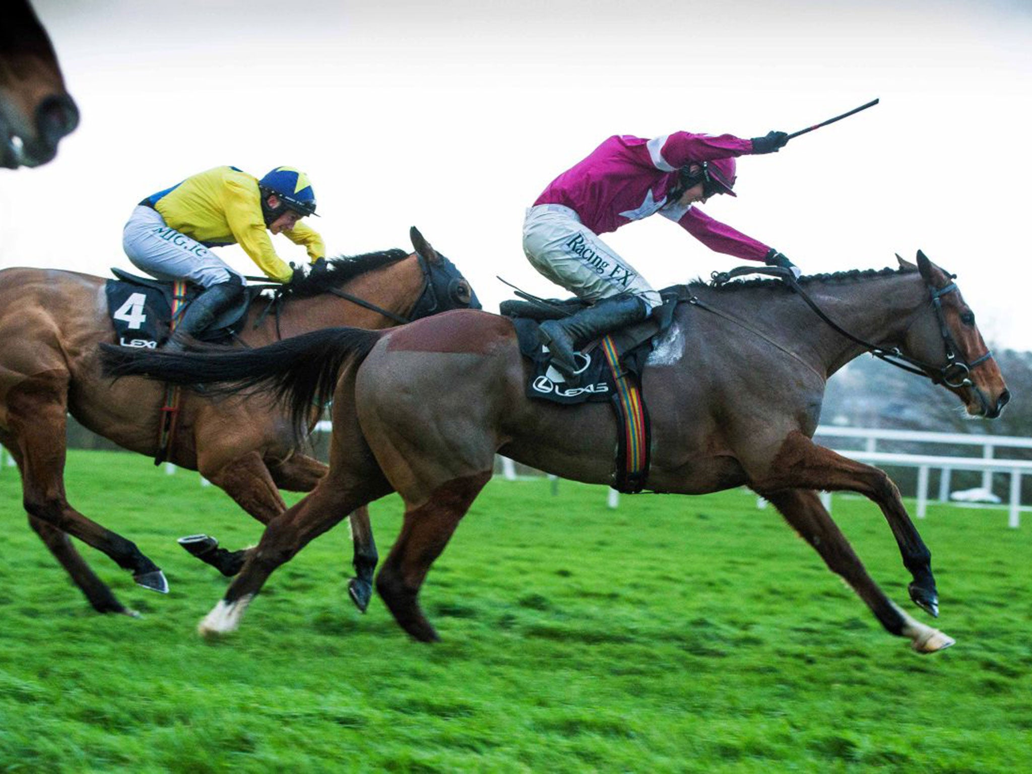 Bryan Cooper urges Don Poli ahead of the eventual third Foxrock to win the Grade One Lexus Chase at Leopardstown