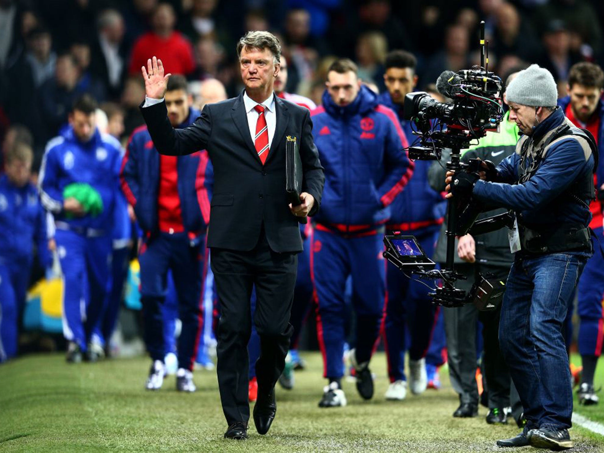 The Manchester United manager, Louis van Gaal, left, before the game at Old Trafford