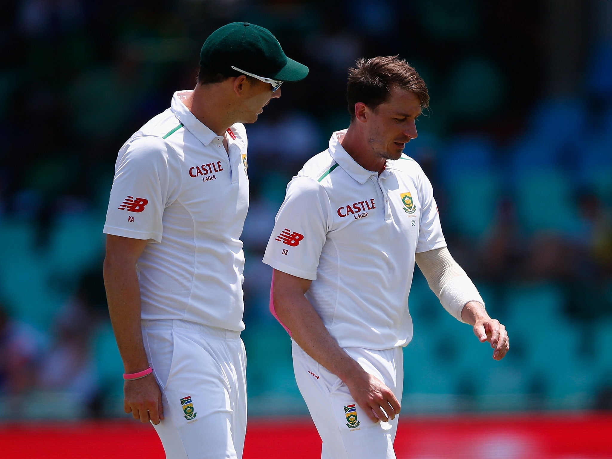 South Africa's Dale Steyn (right) will not bowl again in the first Test with England due to a shoulder injury