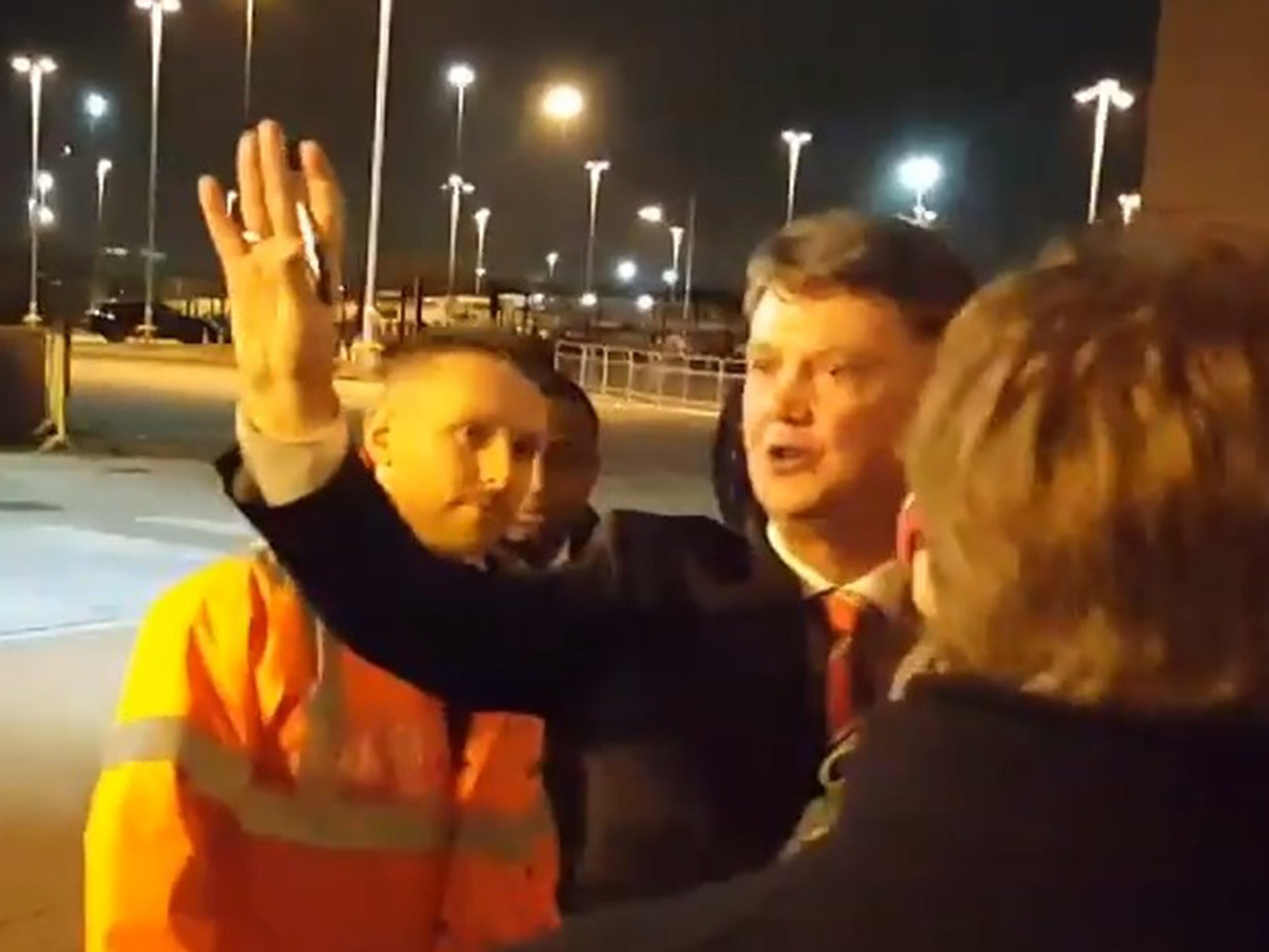 Louis van Gaal shares a joke with some United fans last night