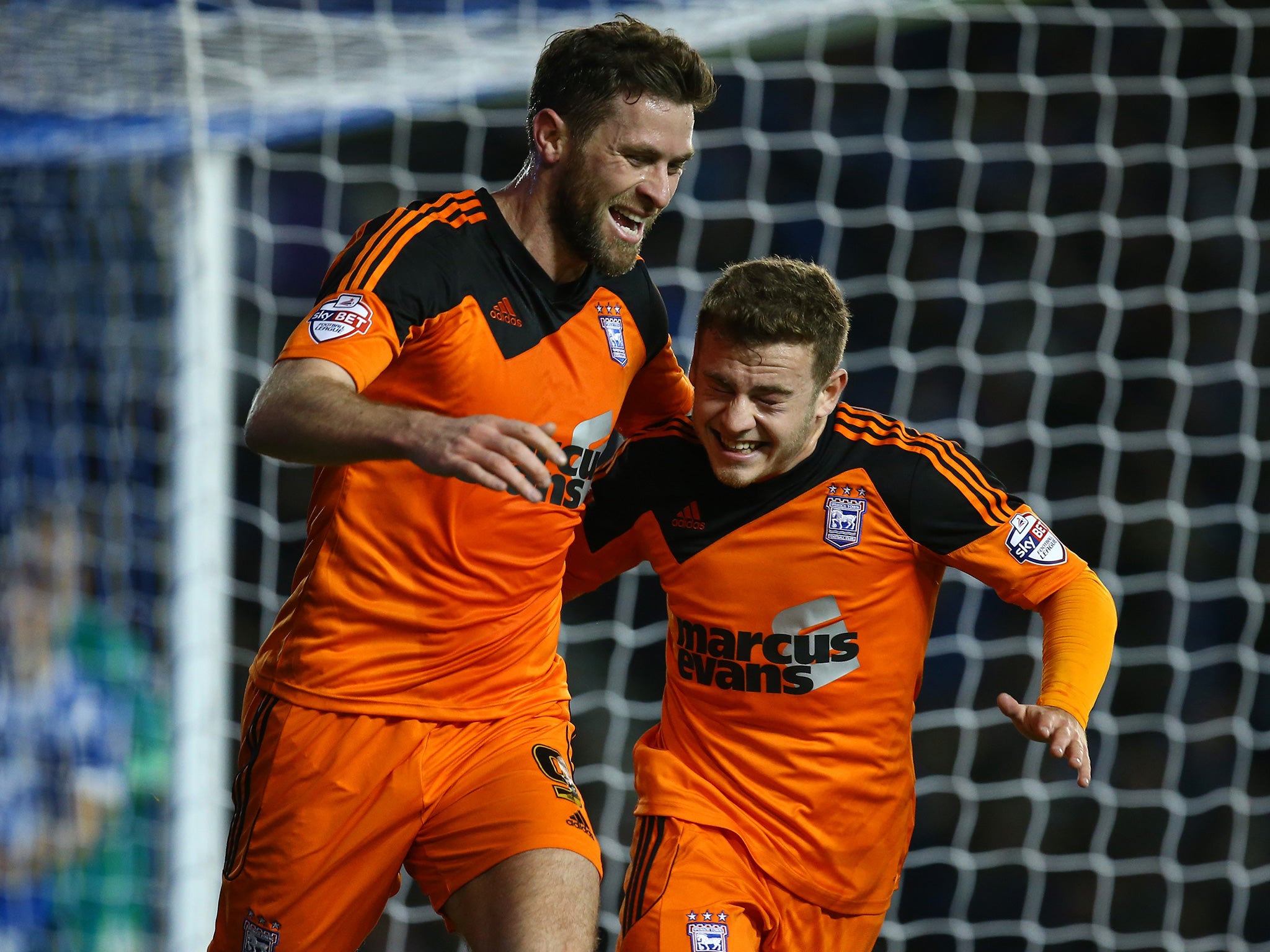 Ipswich’s Daryl Murphy (left) celebrates with Ryan Fraser after scoring the only goal of the match last night