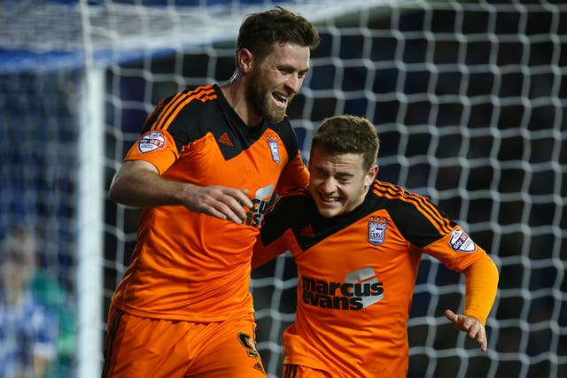 Ipswich’s Daryl Murphy (left) celebrates with Ryan Fraser after scoring the only goal of the match last night