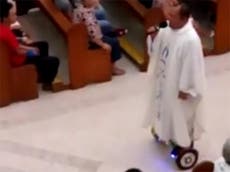 Filipino priest suspended for riding hoverboard at Christmas Eve mass