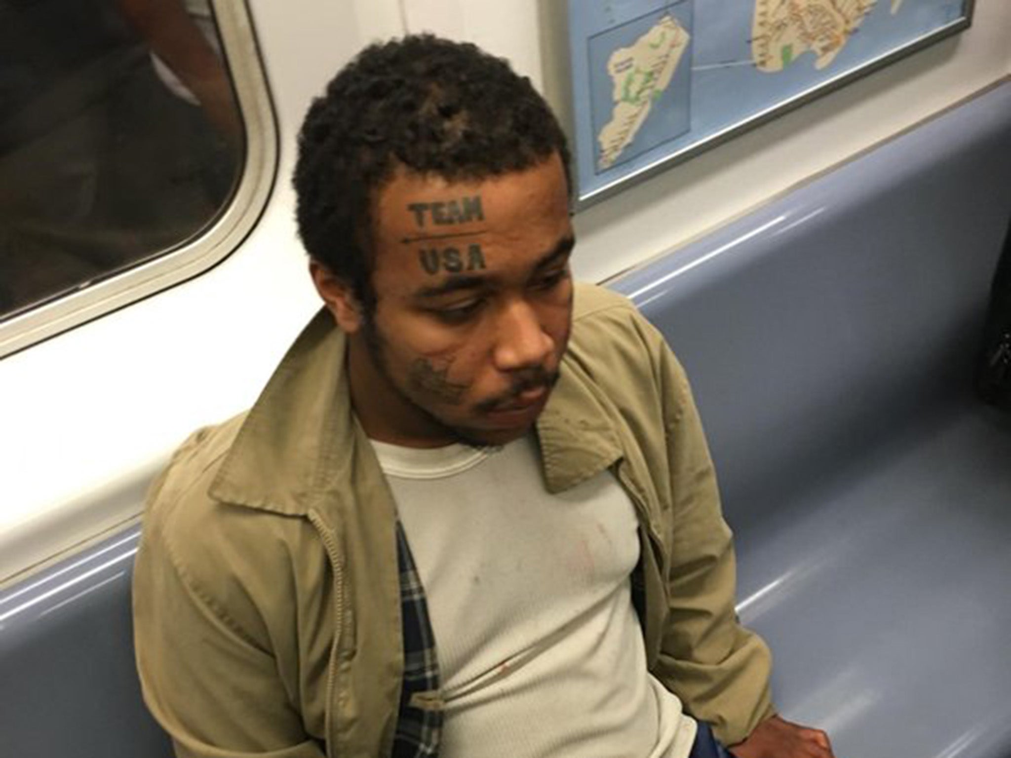 Police hunt man with face tattoo who 'performed sex act' on New York subway