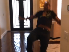 Mike Tyson wipes out trying to ride hoverboard