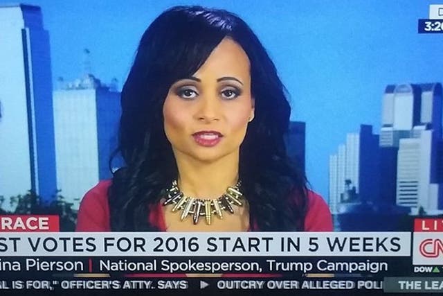 Katrina Pierson, Donald Trump's national spokeswoman, is seen in her CNN interview wearing a necklace made of bullets.