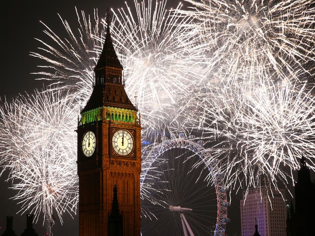 Fireworks light up the London skyline and Big Ben just after midnight on January 1, 2015 in London, England
