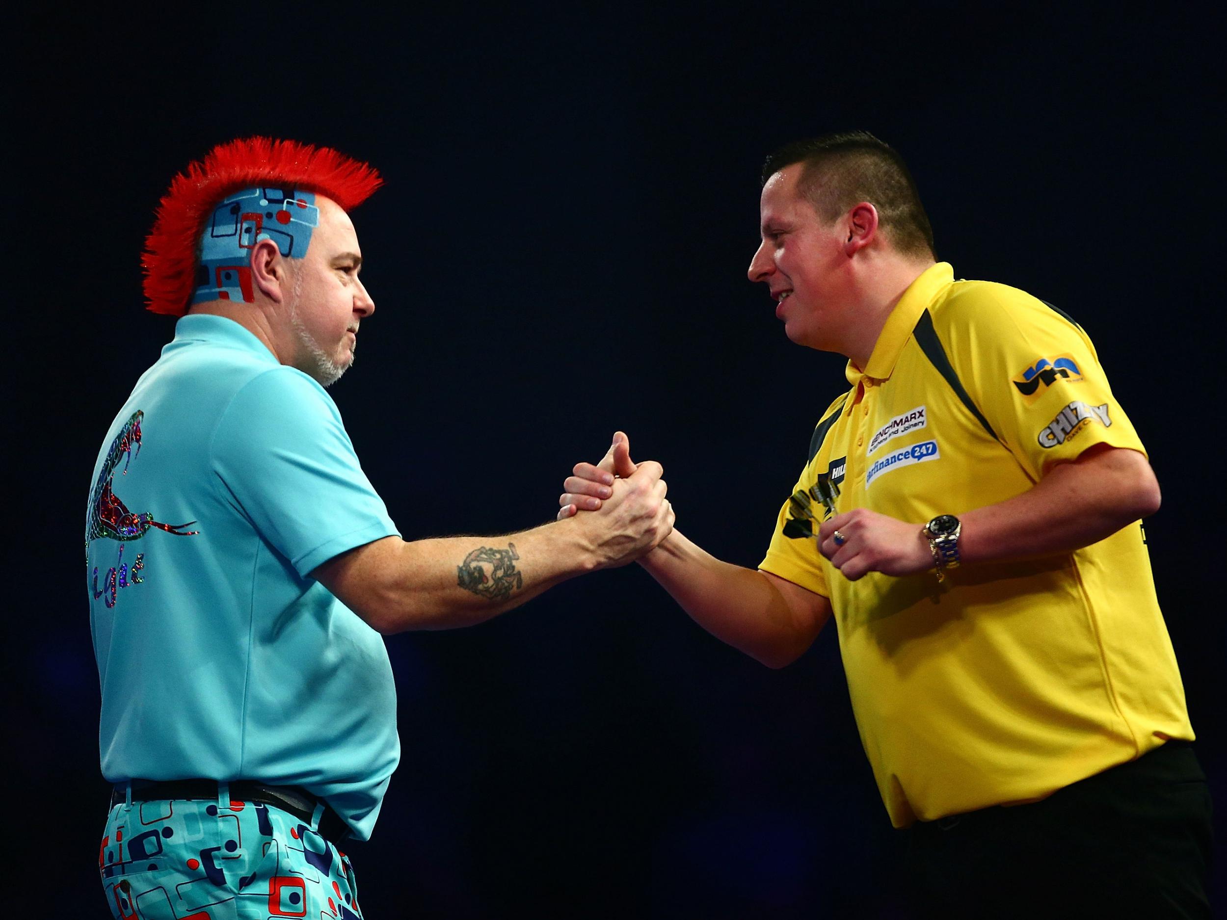 Peter Wright and Dave Chisnall congratulate each other on a thriller at Alexandra Palace