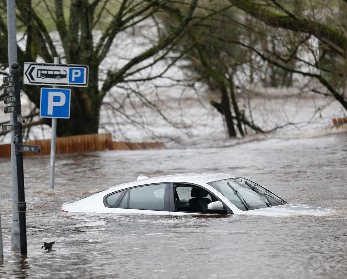 Storm Frank: Man trapped on Scottish bus in chest-high floodwater for ...