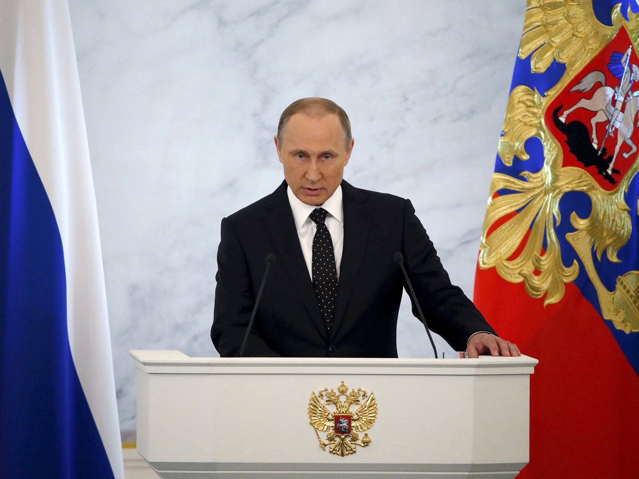 File: Russian President Vladimir Putin addresses the Federal Assembly in December, 2015