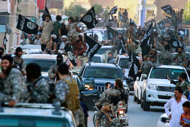 ISIS militants on parade in Syria 
