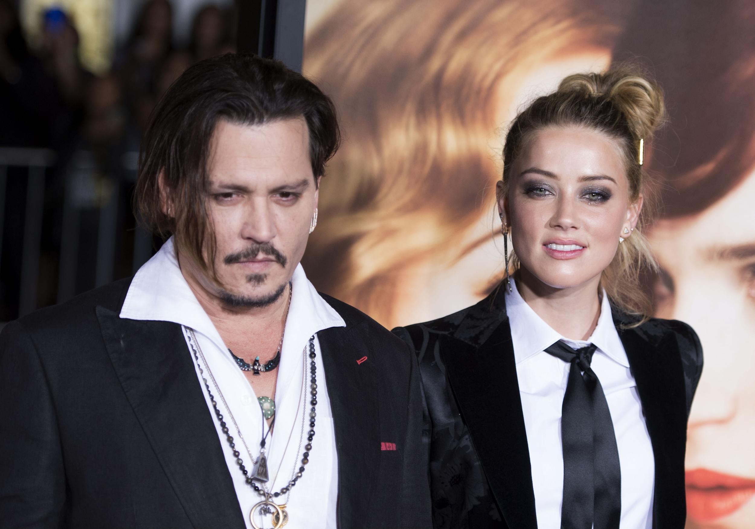 Johnny Depp releases statement after Amber Heard files for divorce after a year of ...