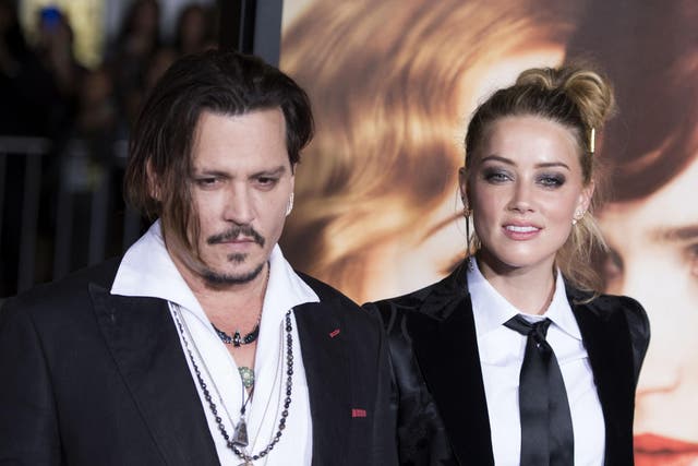 Johnny Depp and Amber Heard attend the Los Angeles Premiere of "The Danish Girl"