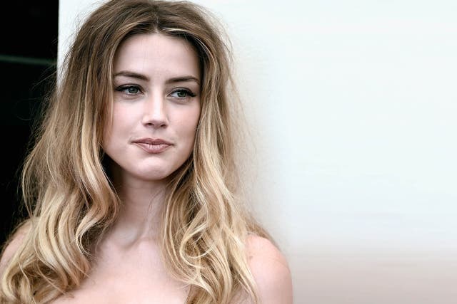 Amber Heard  attends a photocall for 'The Danish Girl' during the 72nd Venice Film Festival