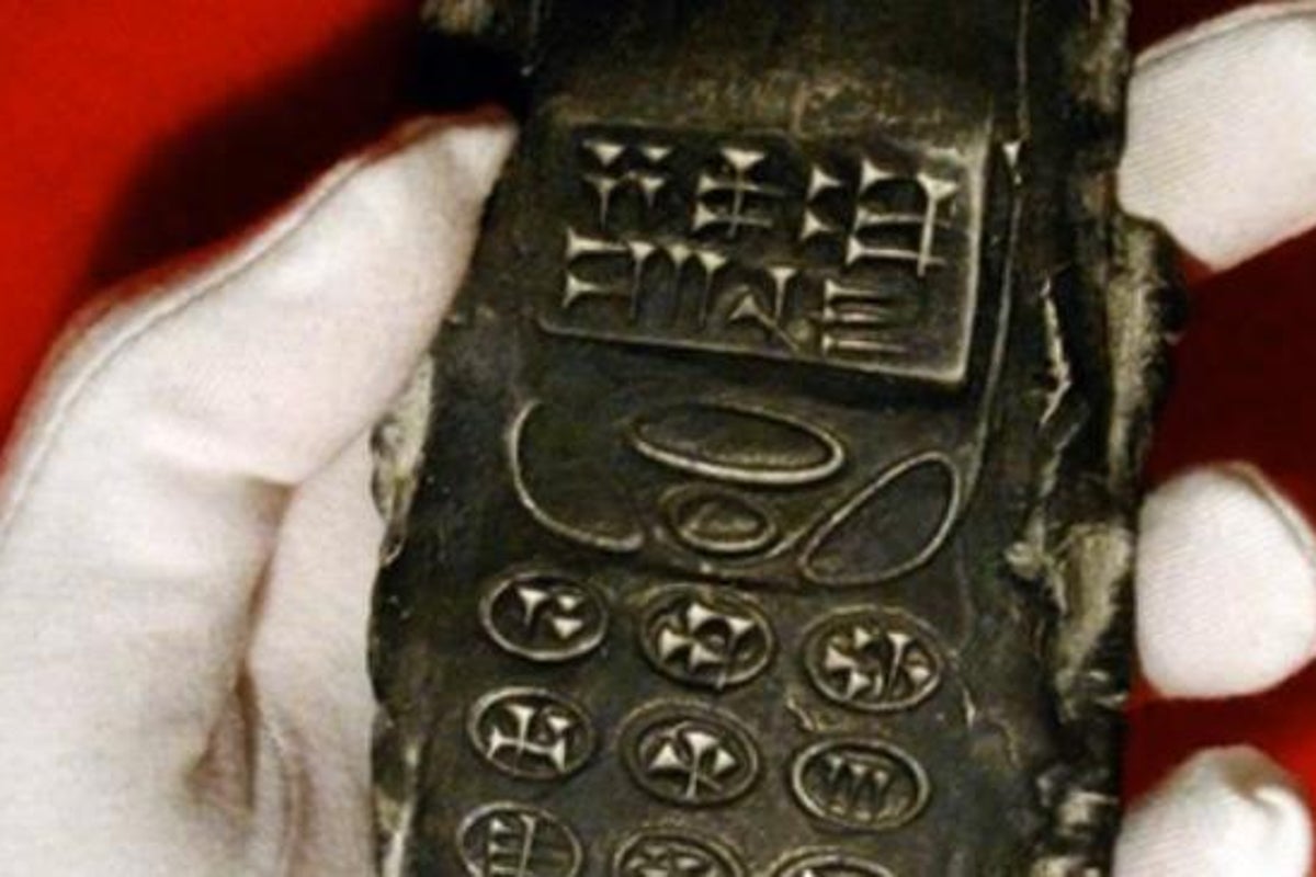 800-year-old mobile phone found: Conspiracy theorists excited by almost  certainly hoax claim to have found handset with cuneiform symbols | The  Independent | The Independent