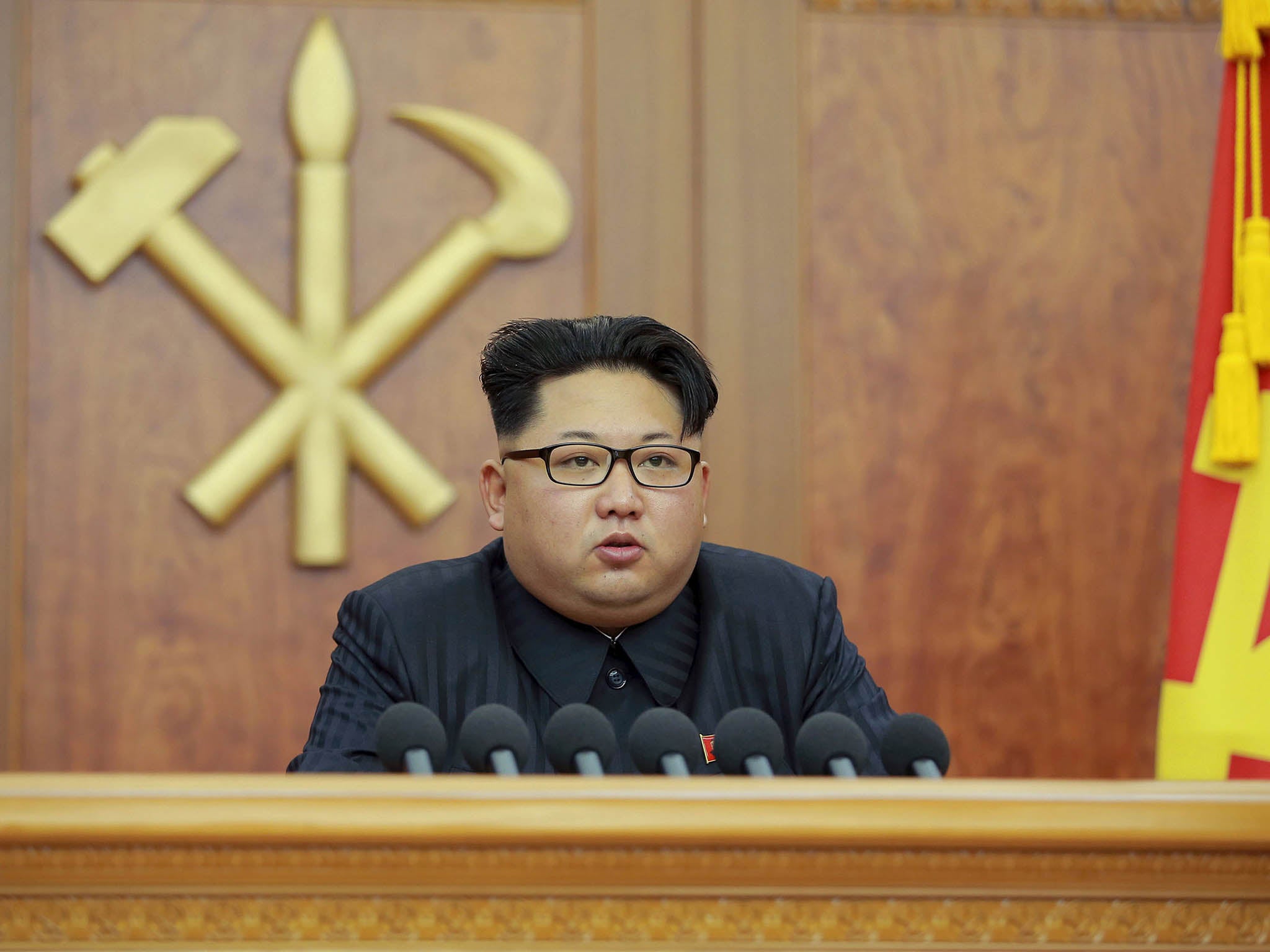 North Korean leader Kim Jong Un gives a New Year's address for 2016 in Pyongyang, in this undated photo released by Kyodo January 1, 2016.