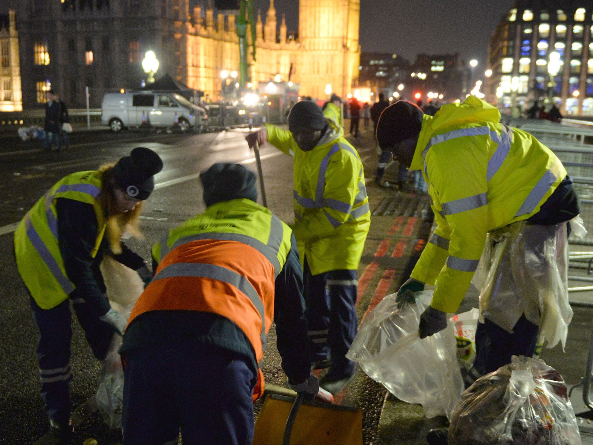 The clean-up begins in central London after the New Year celebration fireworks.