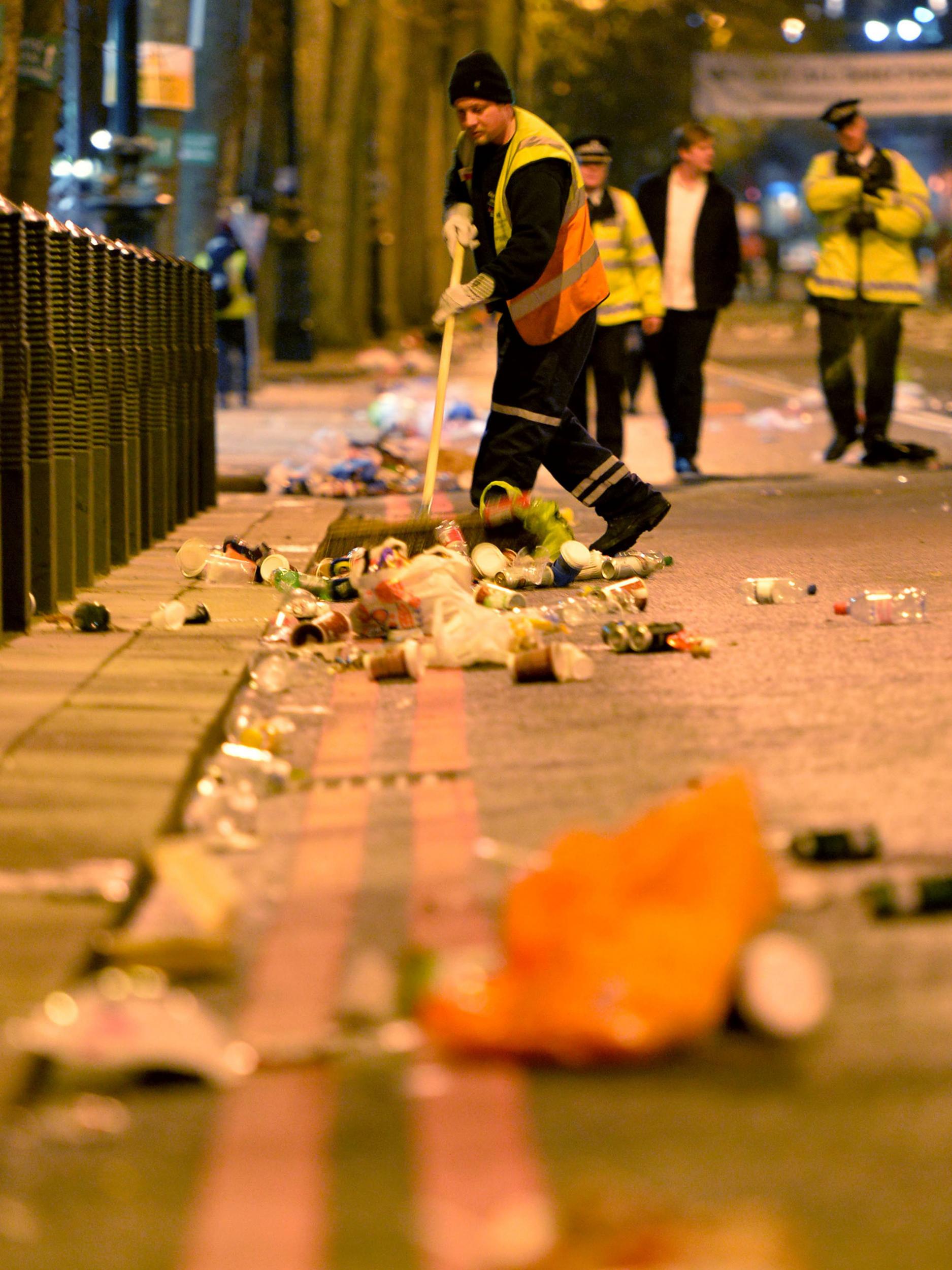 
The clean-up begins in central London after the New Year celebration fireworks PA 