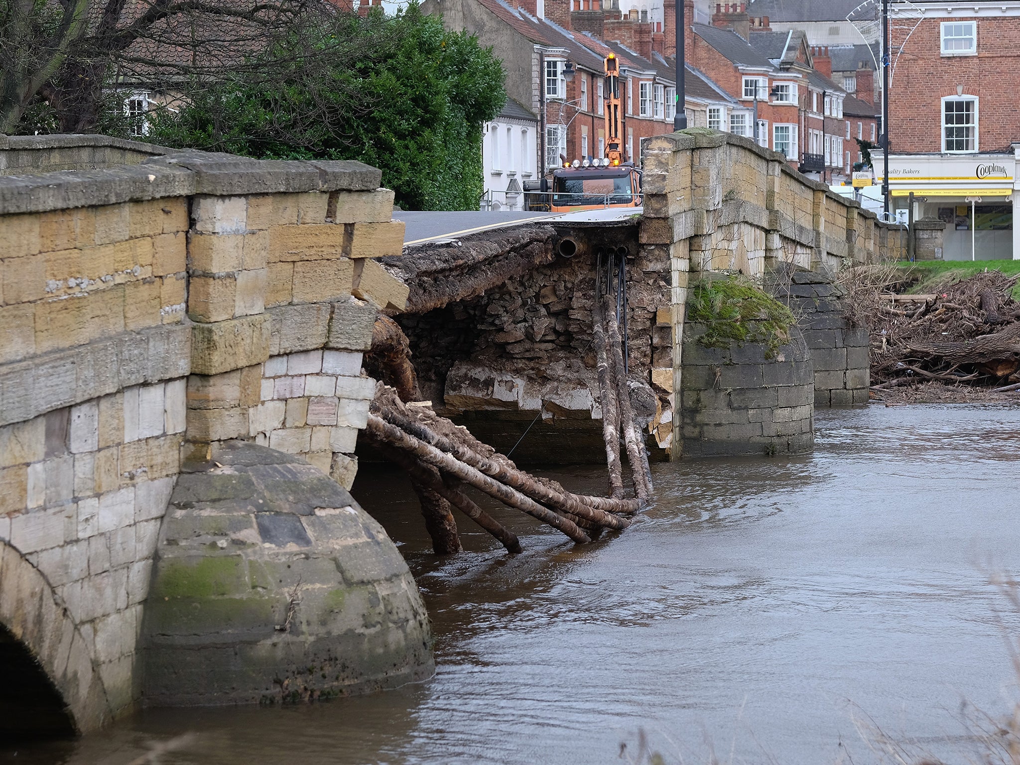 The flooding caused a bridge over the River Wharfe to collapse in the town of Tadcaster.