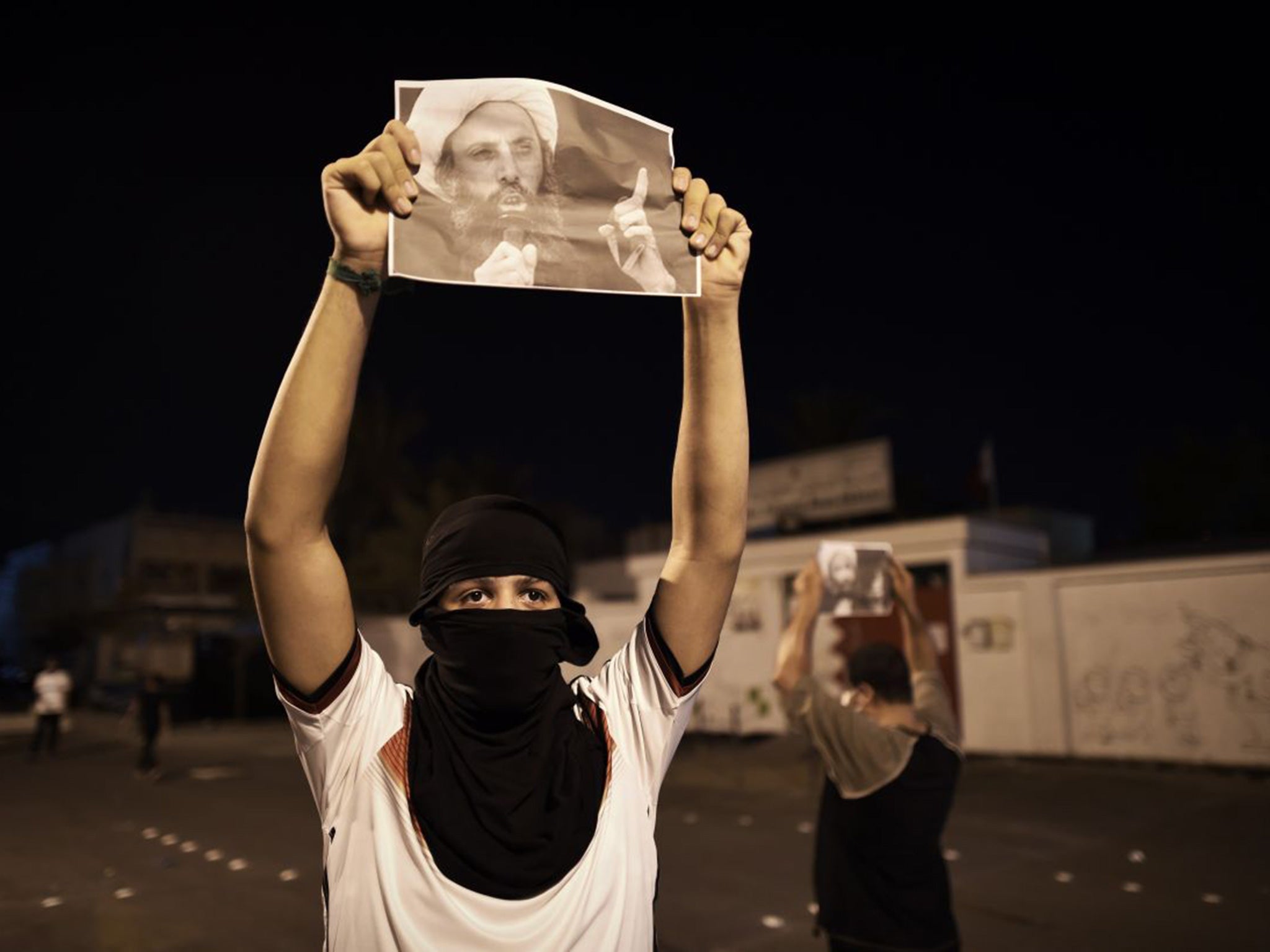 Bahrainis showing solidarity with the Shia cleric Sheikh Nimr al-Nimr