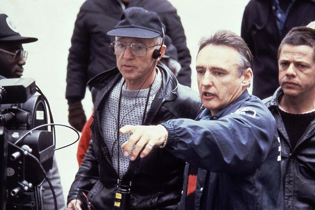 Wexler, centre, with glasses, with director Dennis Hopper during the making of ‘Colors’, which won plaudits for its depiction of gang life in the US