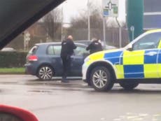 Two arrested after shooting at McDonald's car park