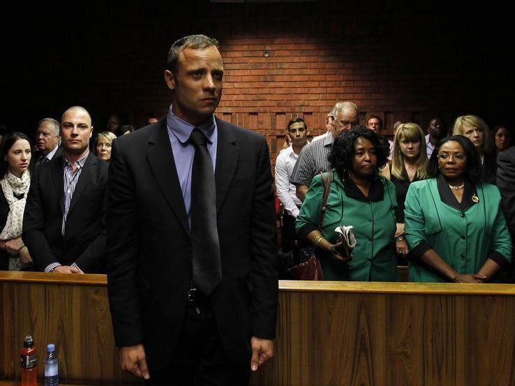 Oscar Pistorius as he awaited trail at Pretoria Magistrates Court in 2013 ( Reuters)