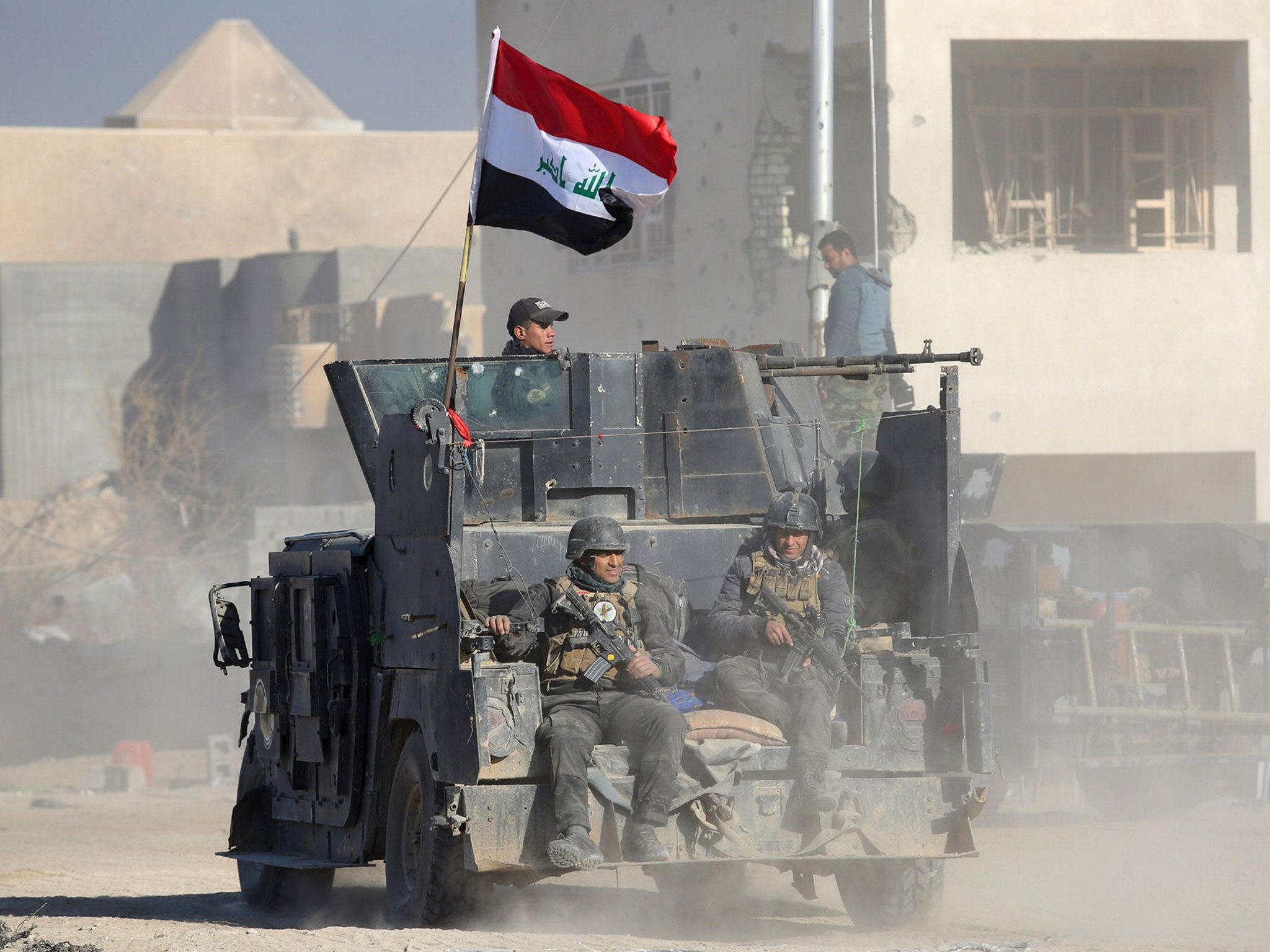 Security forces and contractors are clearing explosives in Ramadi after driving Isis out