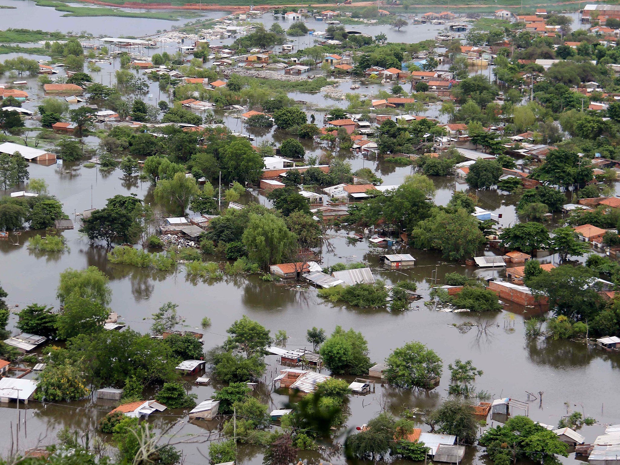 Floods in Asuncion, in Paraguay have left 100,000 people homeless