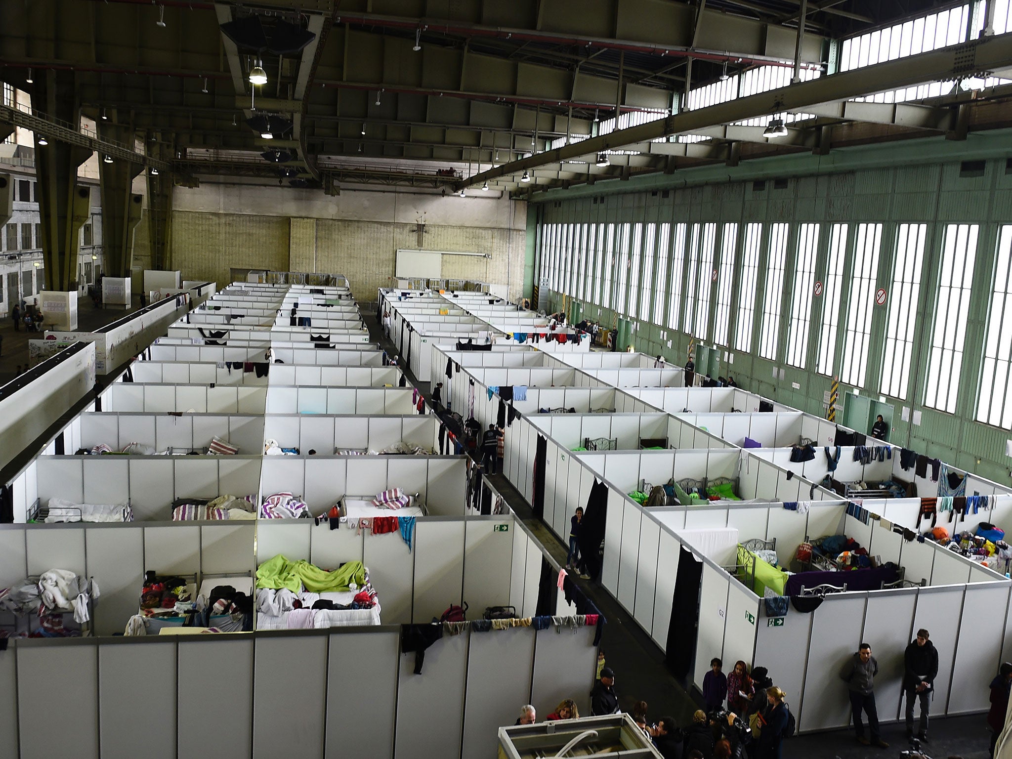 Some refugees are less lucky than those in Schwäbisch Gmünd, living in cramped compartments at Berlin’s old airport