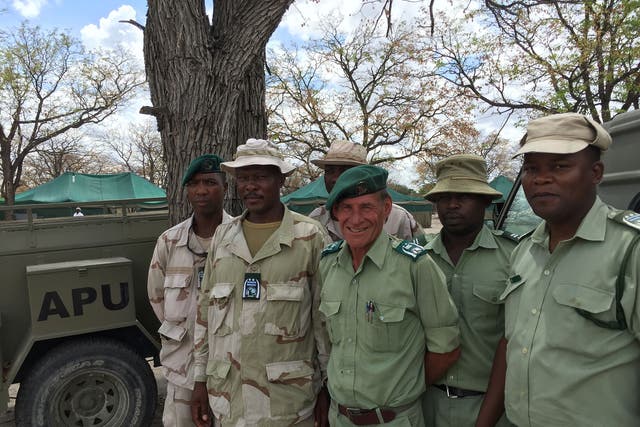 Members of Botswana’s antipoaching unit, with its new chief, Timothy Blackbeard, third right