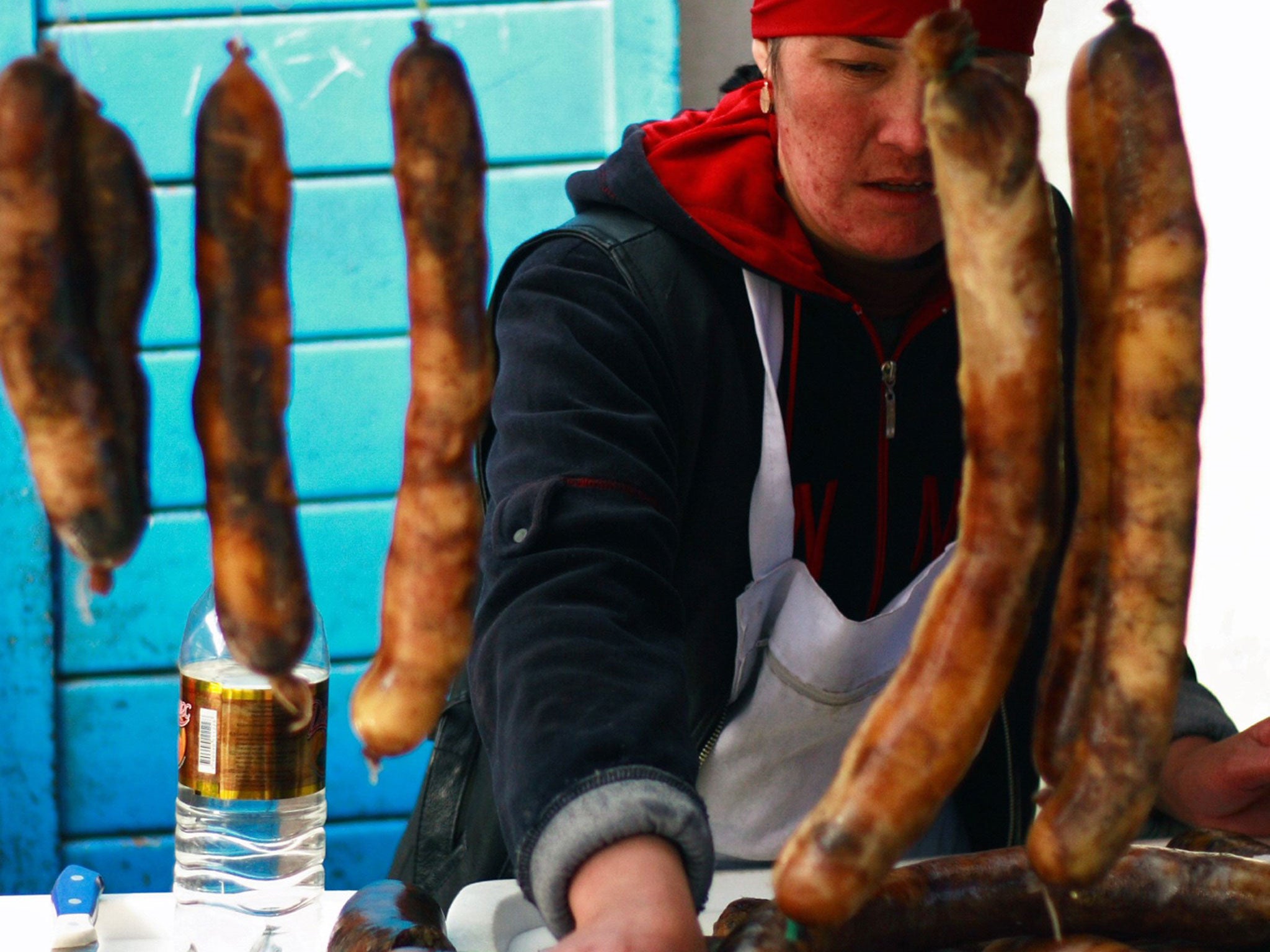 A vendor sells sausages prepared from horse meat