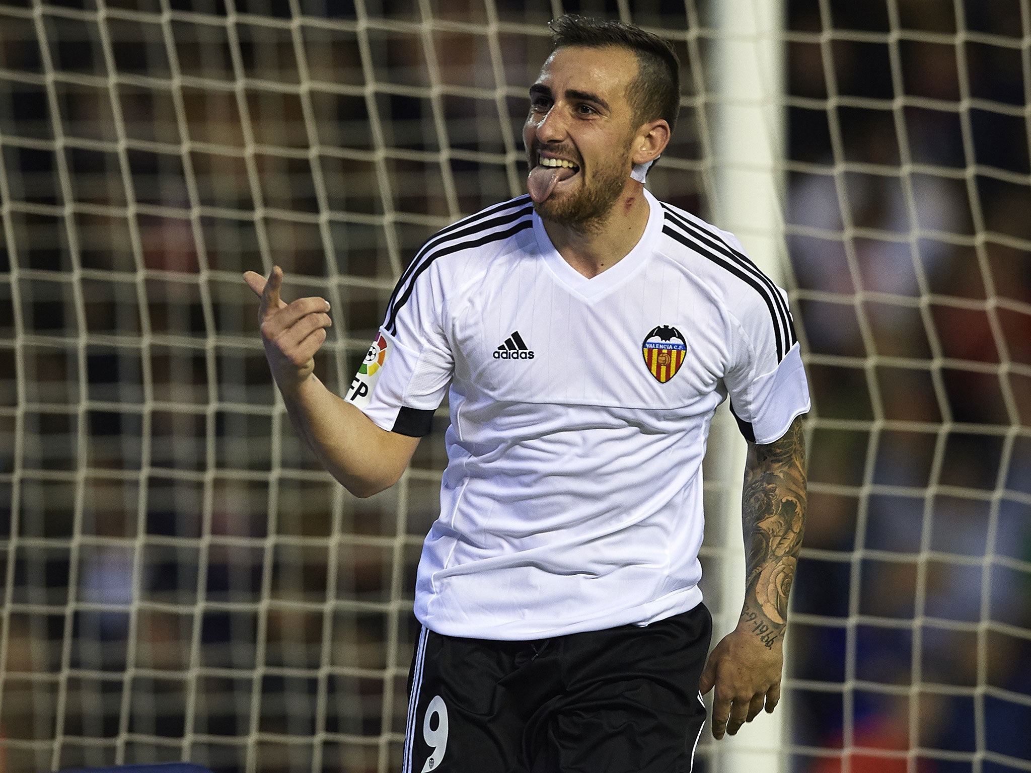 Paco Alcacer celebrates heading Valencia’s equaliser with seven minutes to go at the Mestalla