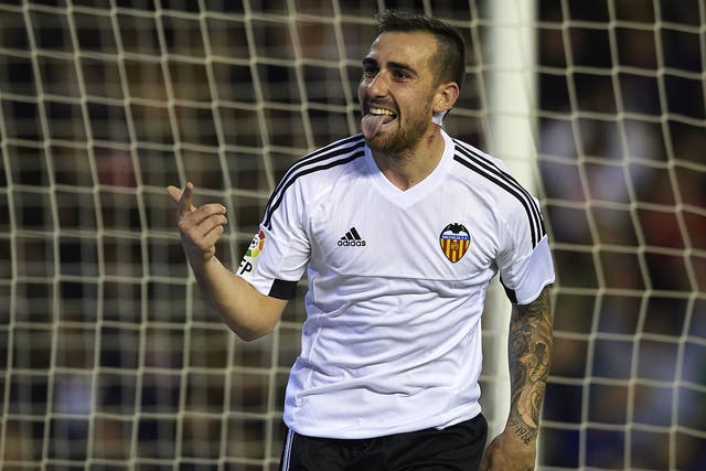 Paco Alcacer celebrates heading Valencia’s equaliser with seven minutes to go at the Mestalla